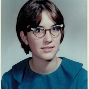 Karly's mother, Teresa, as a young woman with cat-eye glasses